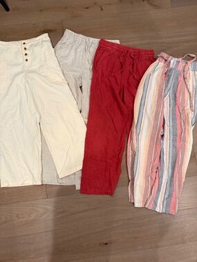 Lot of four linen like pants size small.